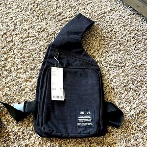 NWT, black crossbody bag, made by Urban Outfitters.